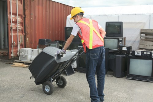 Workers following safety procedures during rubbish collection
